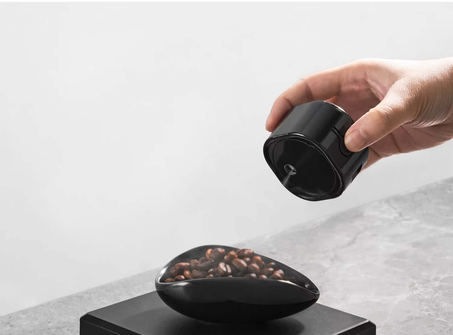 Hauck Atomizer - Electric Anti-Static Bean Sprayer, showcasing sleek design and steam function on a marble surface.